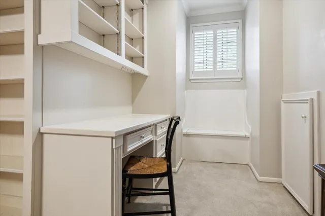 a view of entryway with a table and chairs