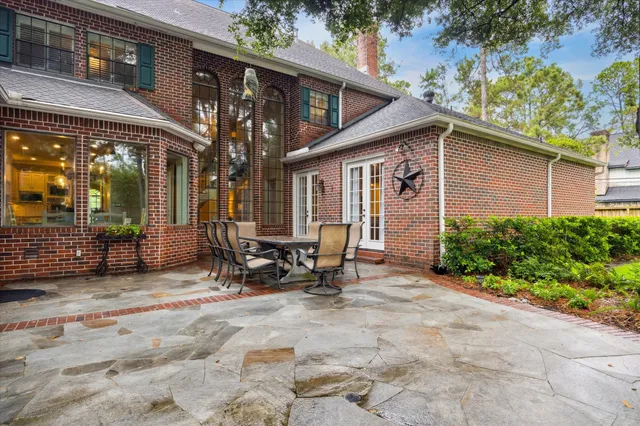a view of the house with outdoor seating area
