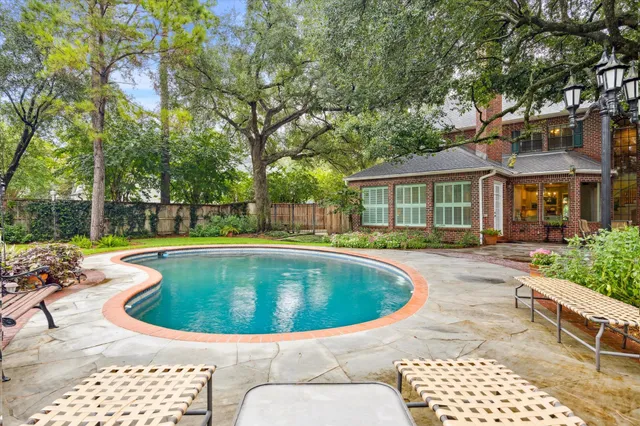 a view of outdoor space yard swimming pool and patio