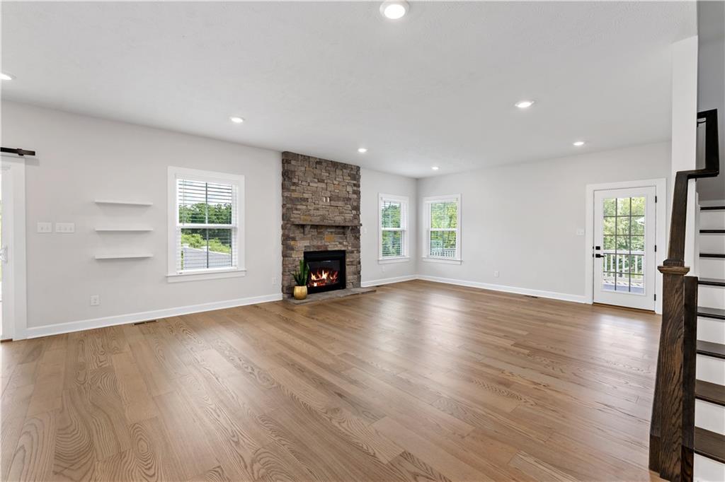 107 Abigail Drive Mars, PA 16046 - Photo 15 of 50 an empty room with windows and a fireplace