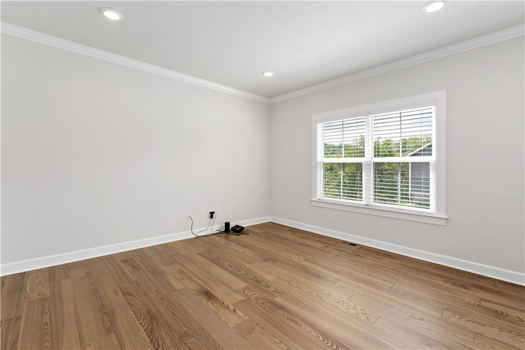 107 Abigail Drive Mars, PA 16046 - Photo 21 of 50 an empty room with wooden floor and windows