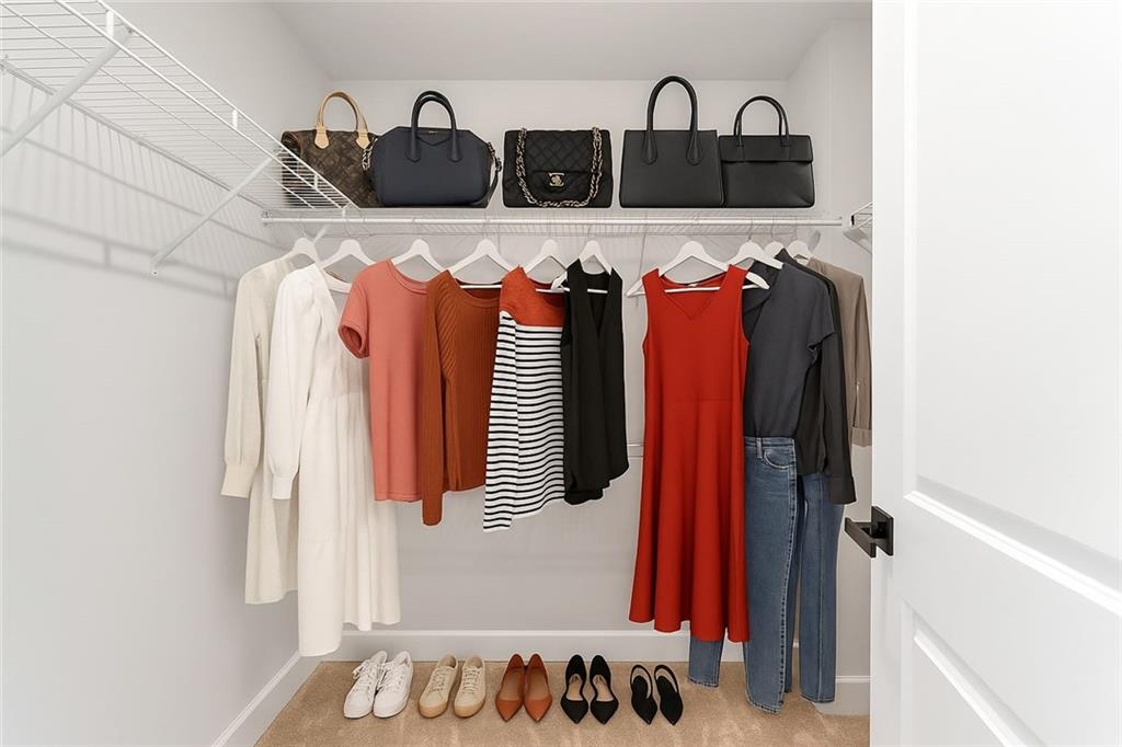 107 Abigail Drive Mars, PA 16046 - Photo 32 of 50 a view of walk in closet with clothes and shoes