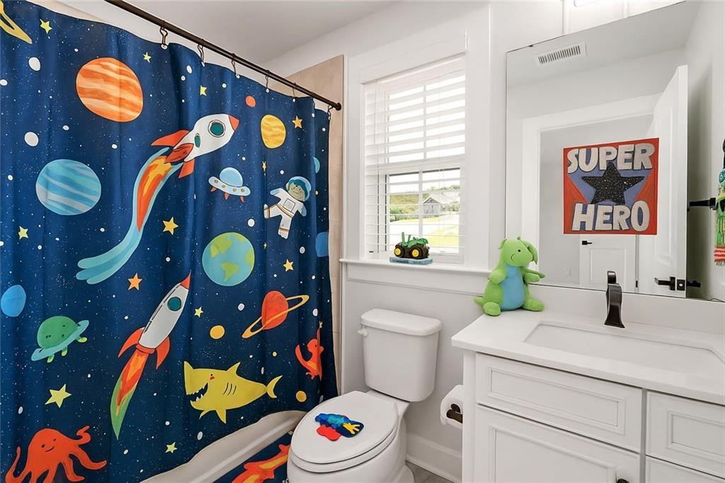 107 Abigail Drive Mars, PA 16046 - Photo 35 of 50 a bathroom with a sink mirror vanity and toilet