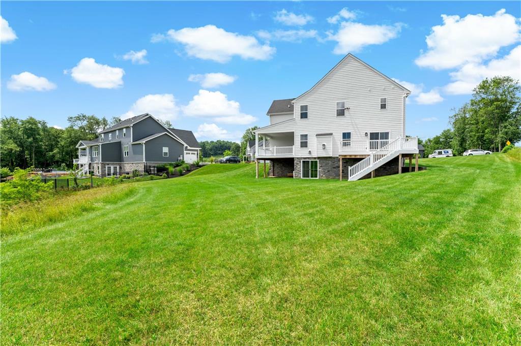 107 Abigail Drive Mars, PA 16046 - Photo 46 of 50 a view of a house with a big yard and large trees