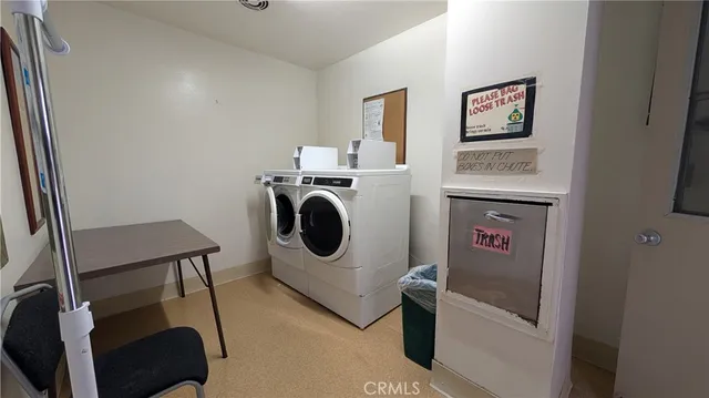 a view of a hallway with seating space