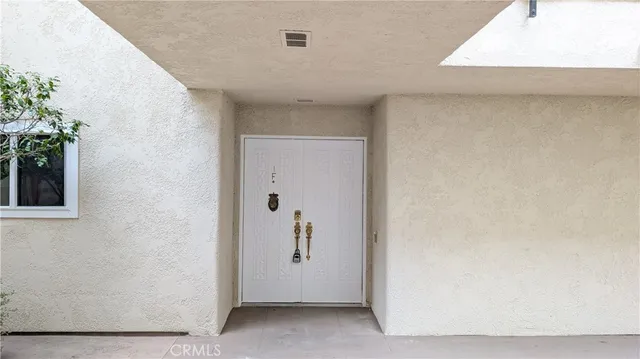 a view of a room with window wooden floor and garden view