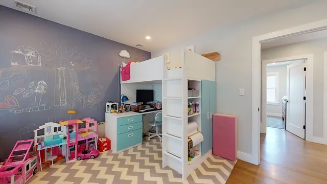 a very nice looking room with a dining table chairs