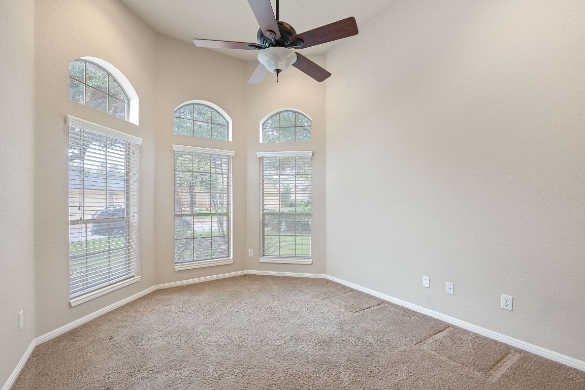 1809 Cross Draw Trail Leander, TX 78641 - Photo 11 of 22 a view of an empty room with a window