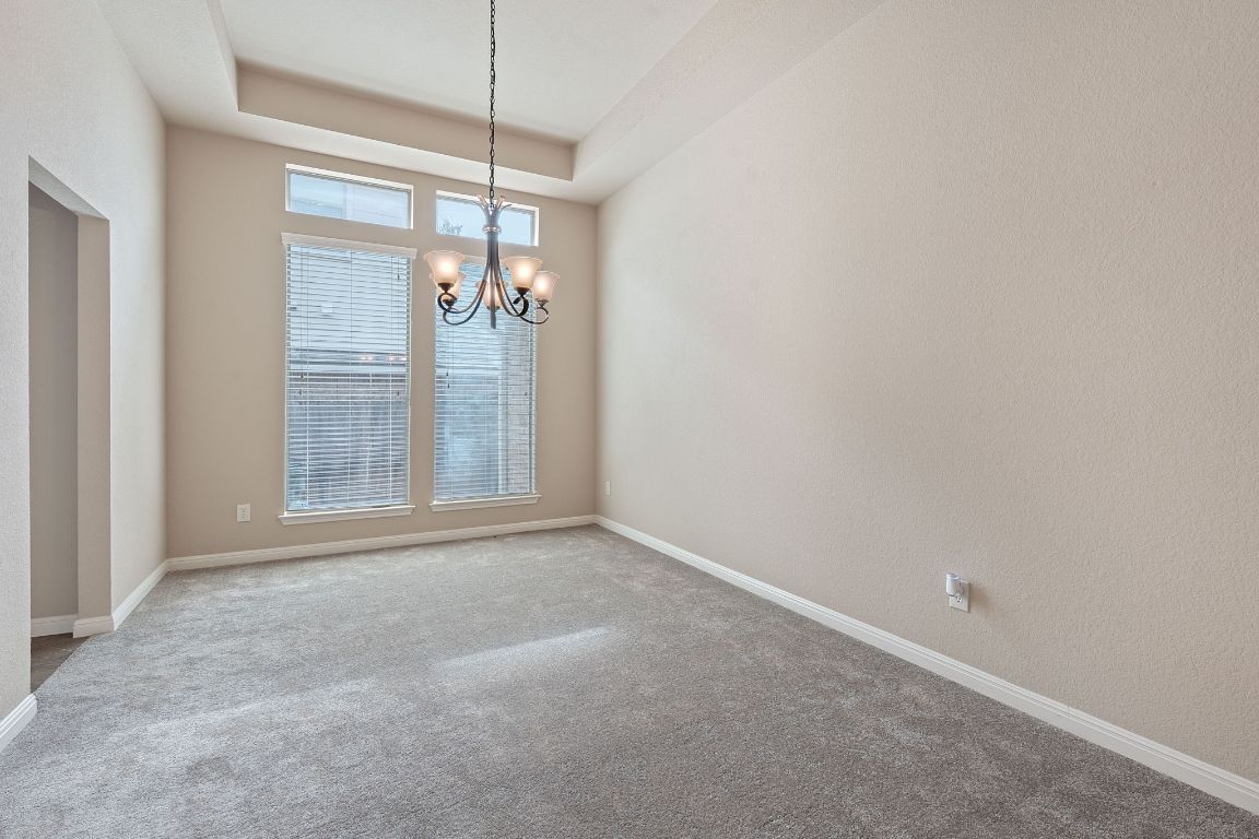 1809 Cross Draw Trail Leander, TX 78641 - Photo 12 of 22 a view of an empty room with a window