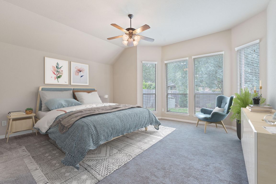 1809 Cross Draw Trail Leander, TX 78641 - Photo 13 of 22 a spacious bedroom with a bed and a large window