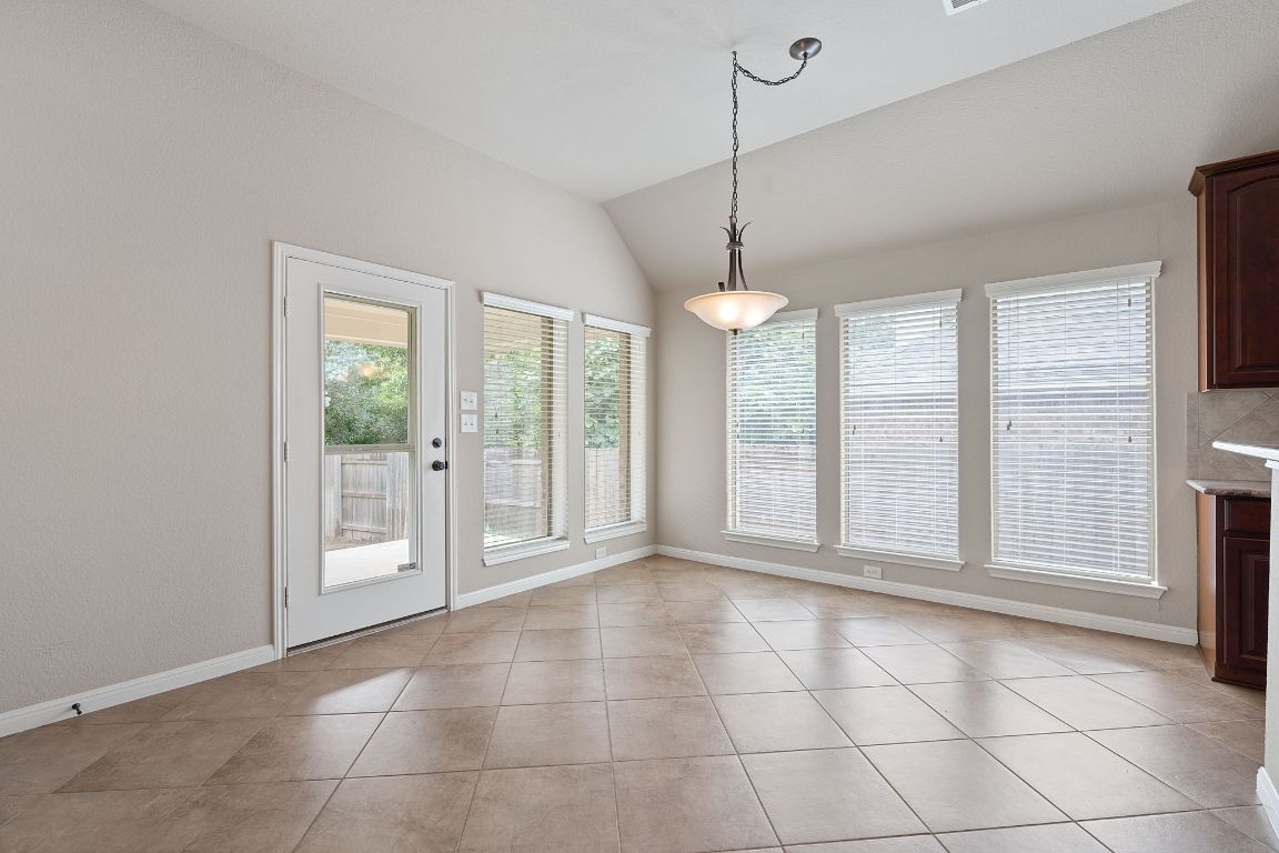 1809 Cross Draw Trail Leander, TX 78641 - Photo 8 of 22 a view of an empty room with a window