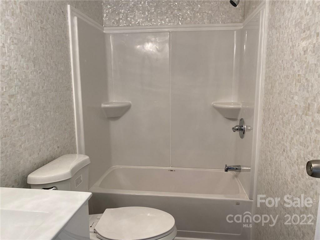 3283 Rhyner Road Lancaster, SC 29720 - Photo 27 of 35 a bathroom with a toilet and a shower
