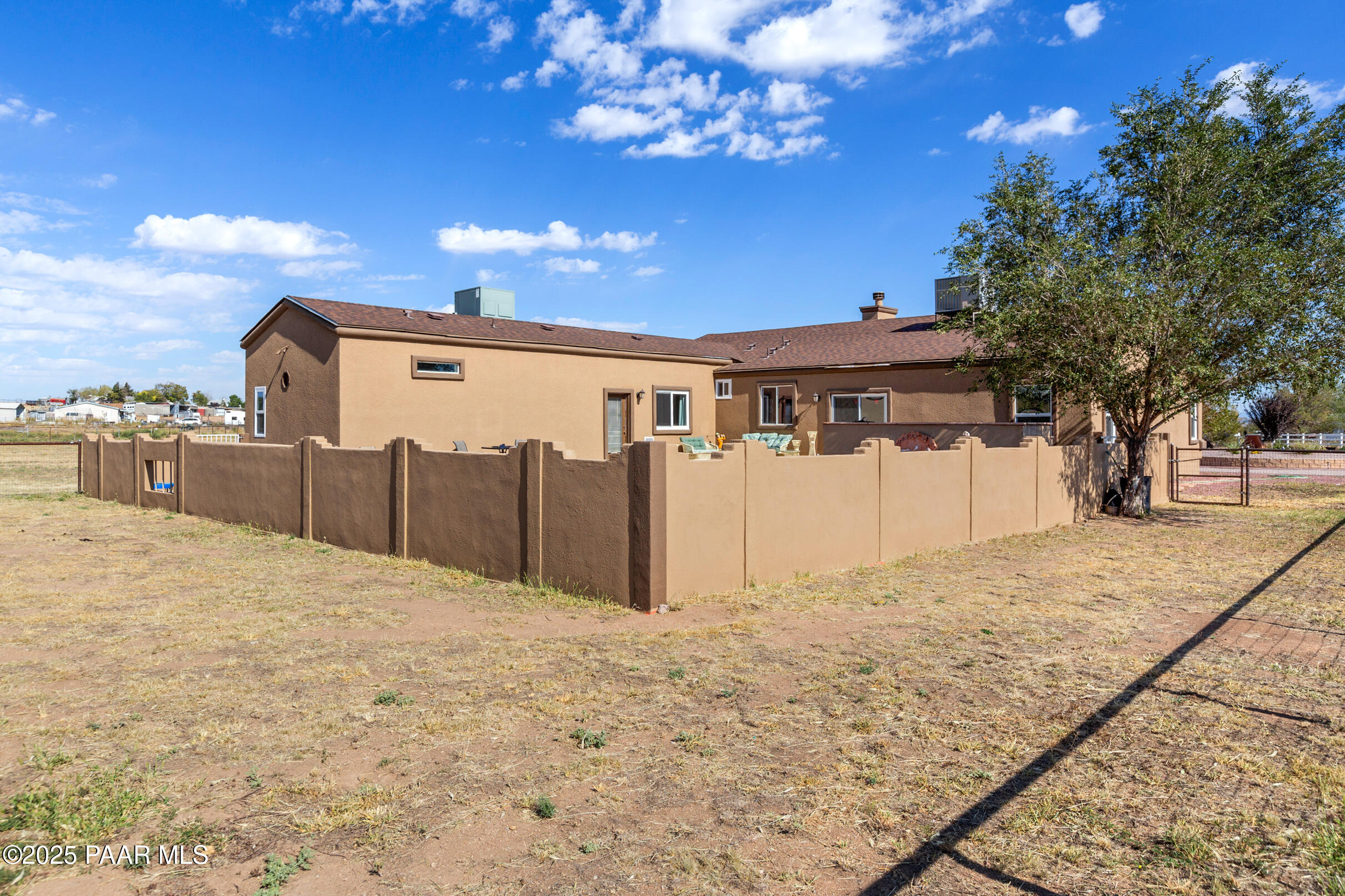 1780 South Yellow Brick Road Chino Valley, AZ 86323 - Photo 36 of 47 a view of a house with a yard