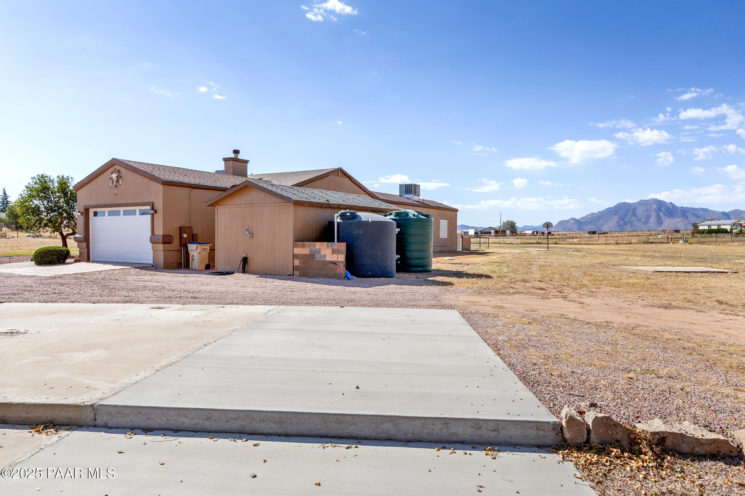 1780 South Yellow Brick Road Chino Valley, AZ 86323 - Photo 42 of 47 a front view of a house with a yard