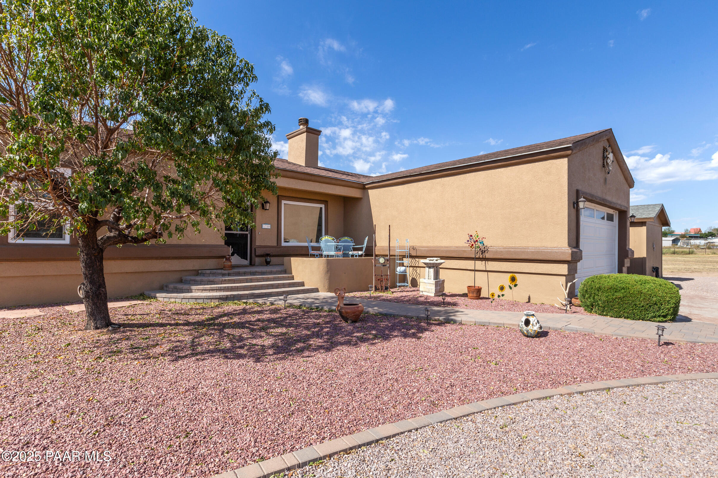 1780 South Yellow Brick Road Chino Valley, AZ 86323 - Photo 8 of 47 a view of a street with a house in the background