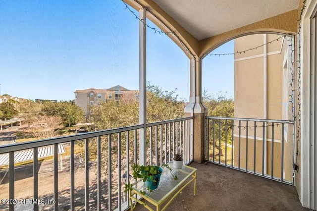 a view of a house with a street