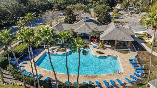 a view of a swimming pool with a garden