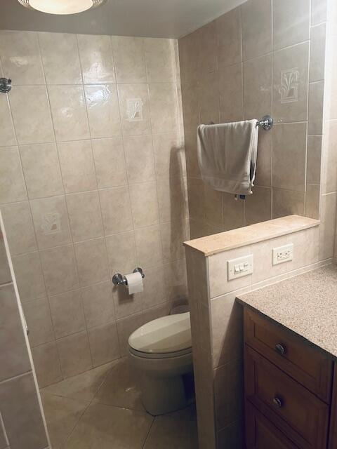 951 De Soto Road, Unit 233 Boca Raton, FL 33432 - Photo 21 of 41 a bathroom with a sink a toilet and shower