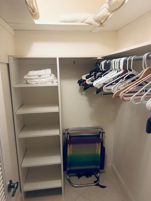 951 De Soto Road, Unit 233 Boca Raton, FL 33432 - Photo 23 of 41 a view of a room with racks on the wall