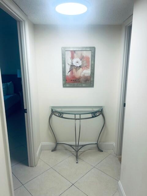 951 De Soto Road, Unit 233 Boca Raton, FL 33432 - Photo 25 of 41 a view of a room with rack on the wall