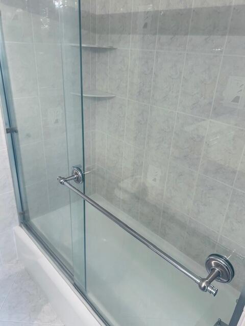 951 De Soto Road, Unit 233 Boca Raton, FL 33432 - Photo 28 of 41 a bathroom with a shower