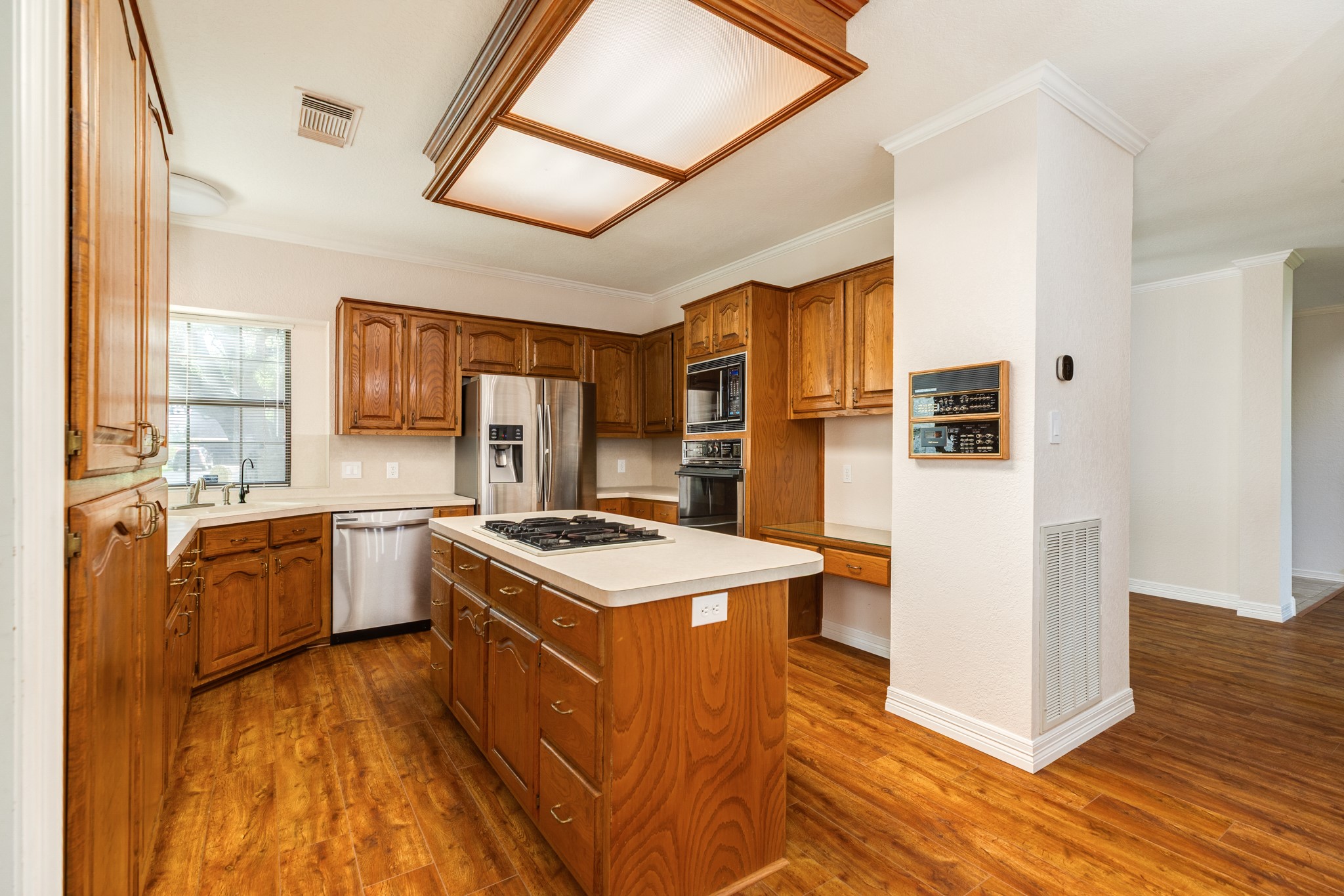1600 Azalea Street Sweeny, TX 77480 - Photo 21 of 42 a kitchen with a sink appliances and cabinets