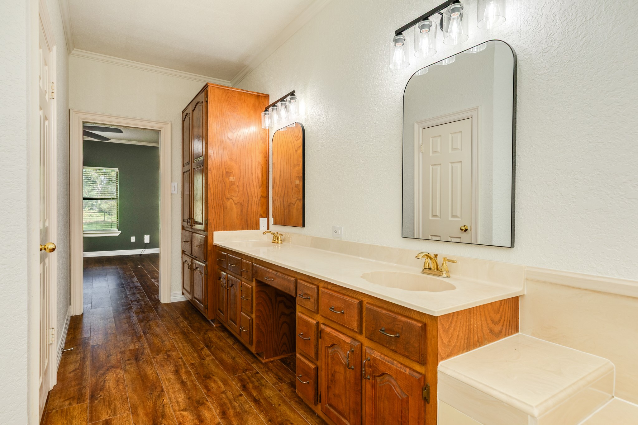 1600 Azalea Street Sweeny, TX 77480 - Photo 27 of 42 a spacious bathroom with a sink and a mirror