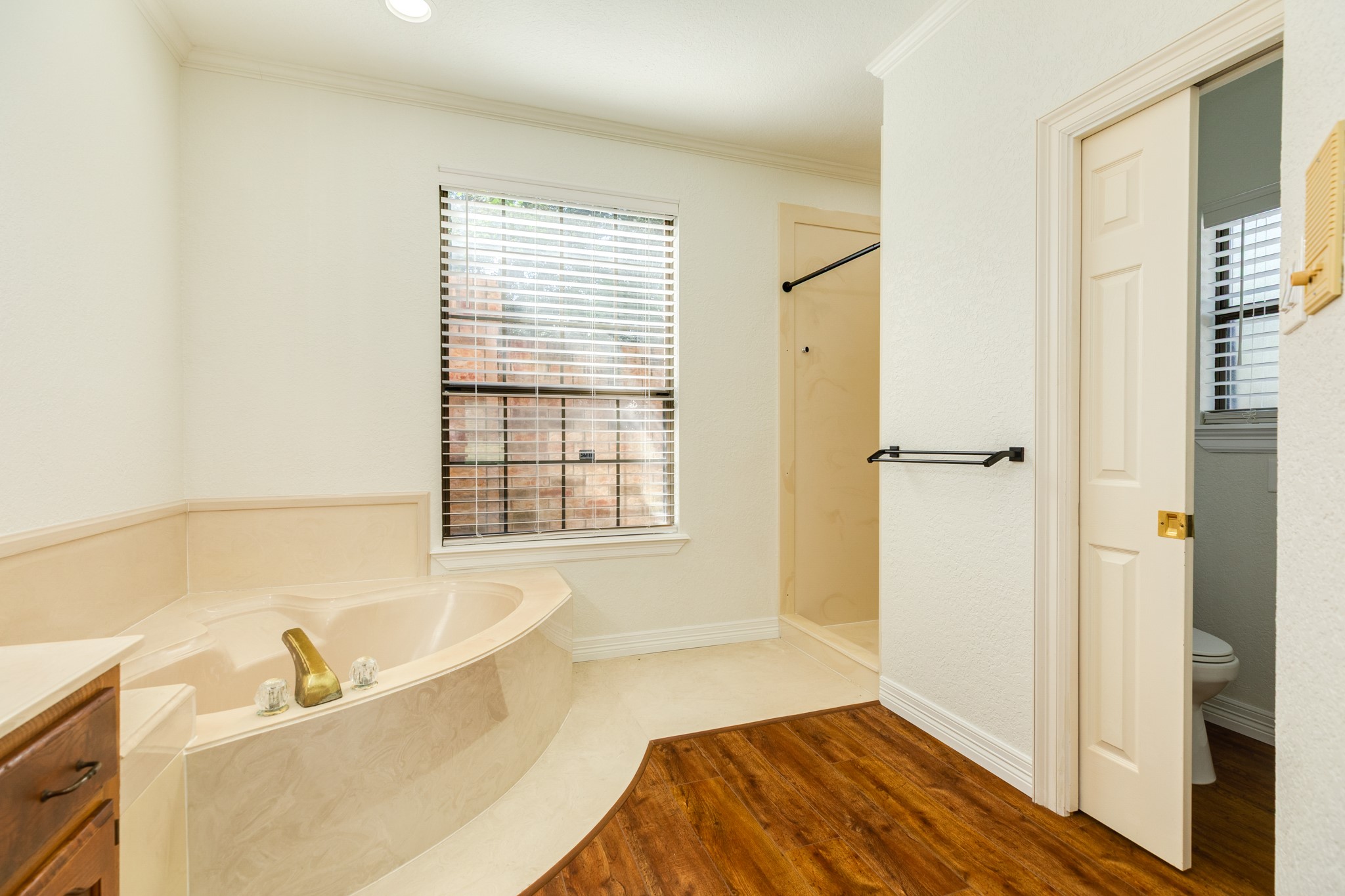 1600 Azalea Street Sweeny, TX 77480 - Photo 28 of 42 a bathroom with a bathtub and shower