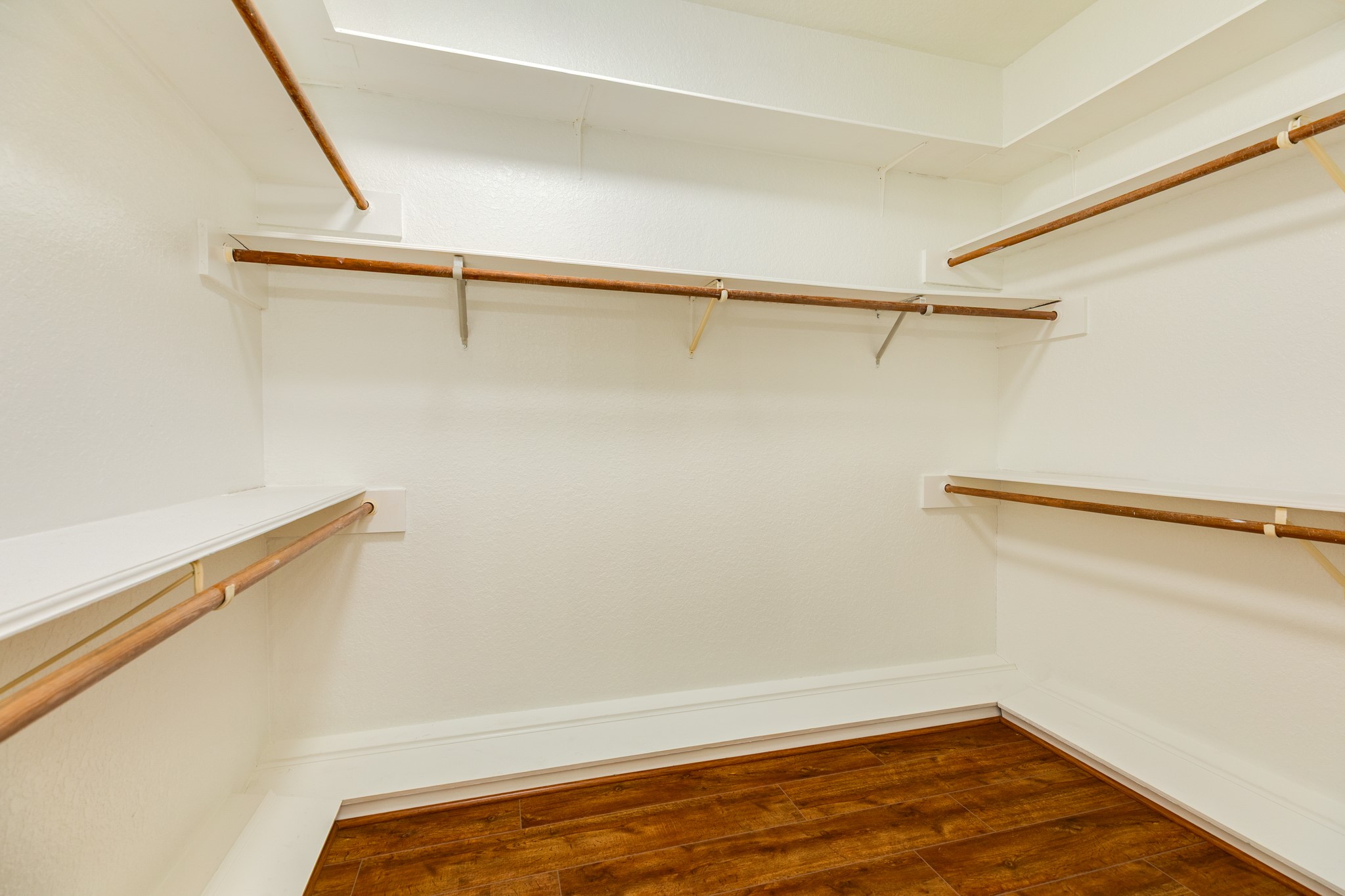 1600 Azalea Street Sweeny, TX 77480 - Photo 29 of 42 a view of a room with racks on the wall