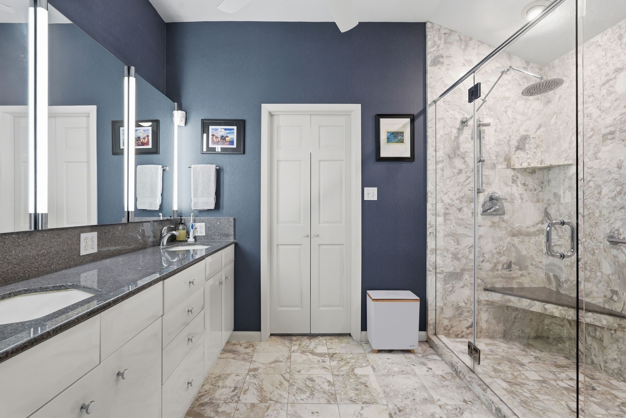 15007 Benfer Road Houston, TX 77069 - Photo 19 of 42 Luxury spa-like bathroom with marble flooring, marble shower, and custom mirror with built in medicine cabinets!