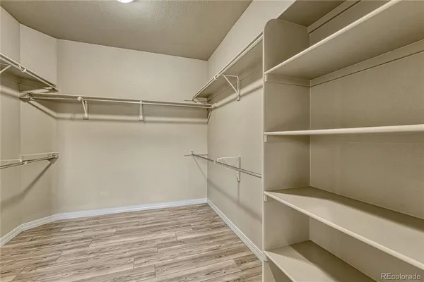 a view of an empty walk in closet
