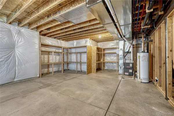 a view of an empty room with closet
