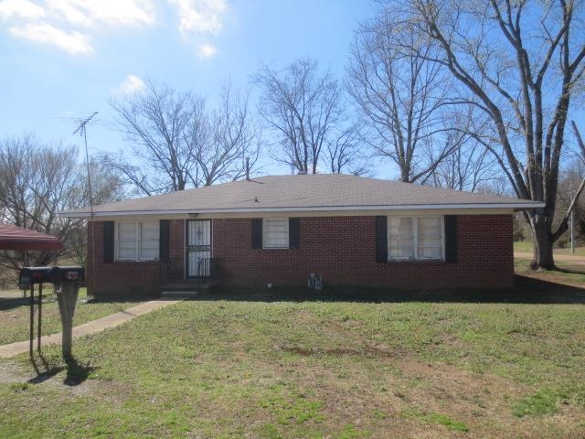 6386 Highway 209 Ripley, TN 38063 - Photo 1 of 23 Single story home featuring a front lawn and brick siding