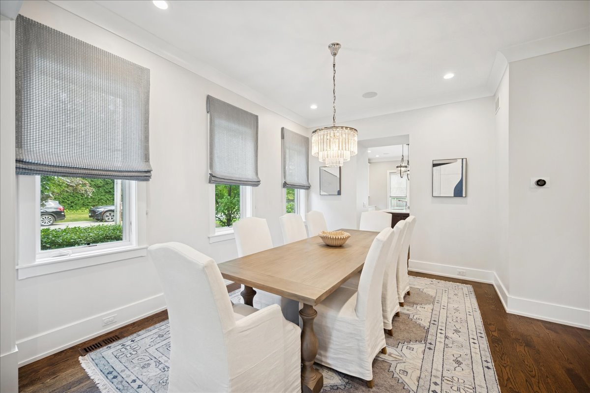 1004 Oak Street Winnetka, IL 60093 - Photo 11 of 51 a view of a kitchen with a table and chairs