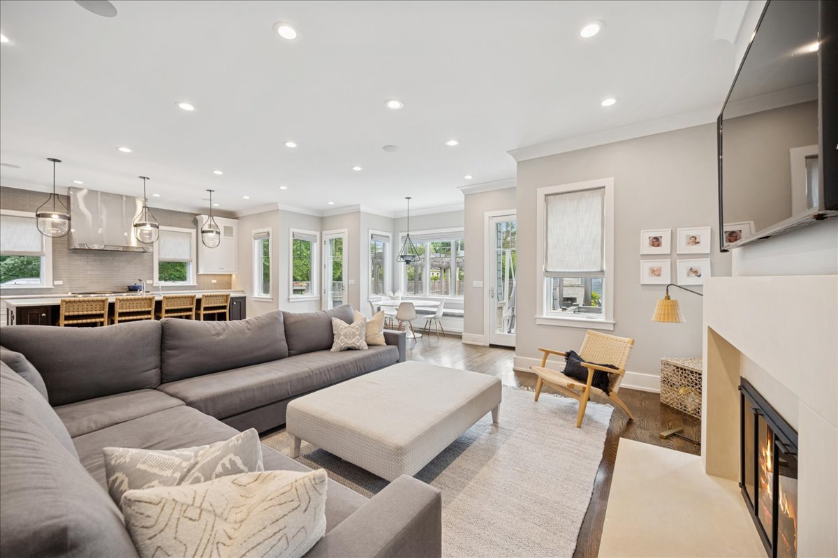 1004 Oak Street Winnetka, IL 60093 - Photo 19 of 51 a living room with furniture and a fireplace