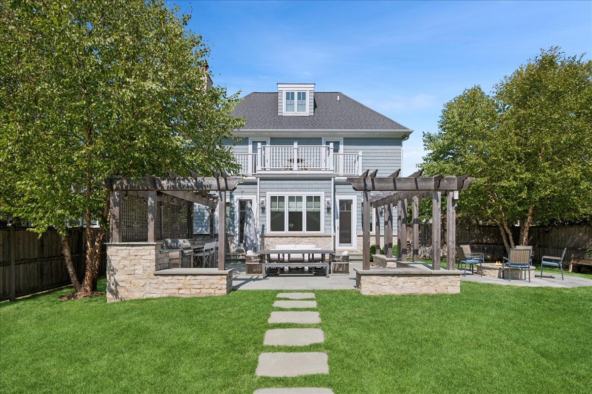1004 Oak Street Winnetka, IL 60093 - Photo 43 of 51 a front view of a building with garden