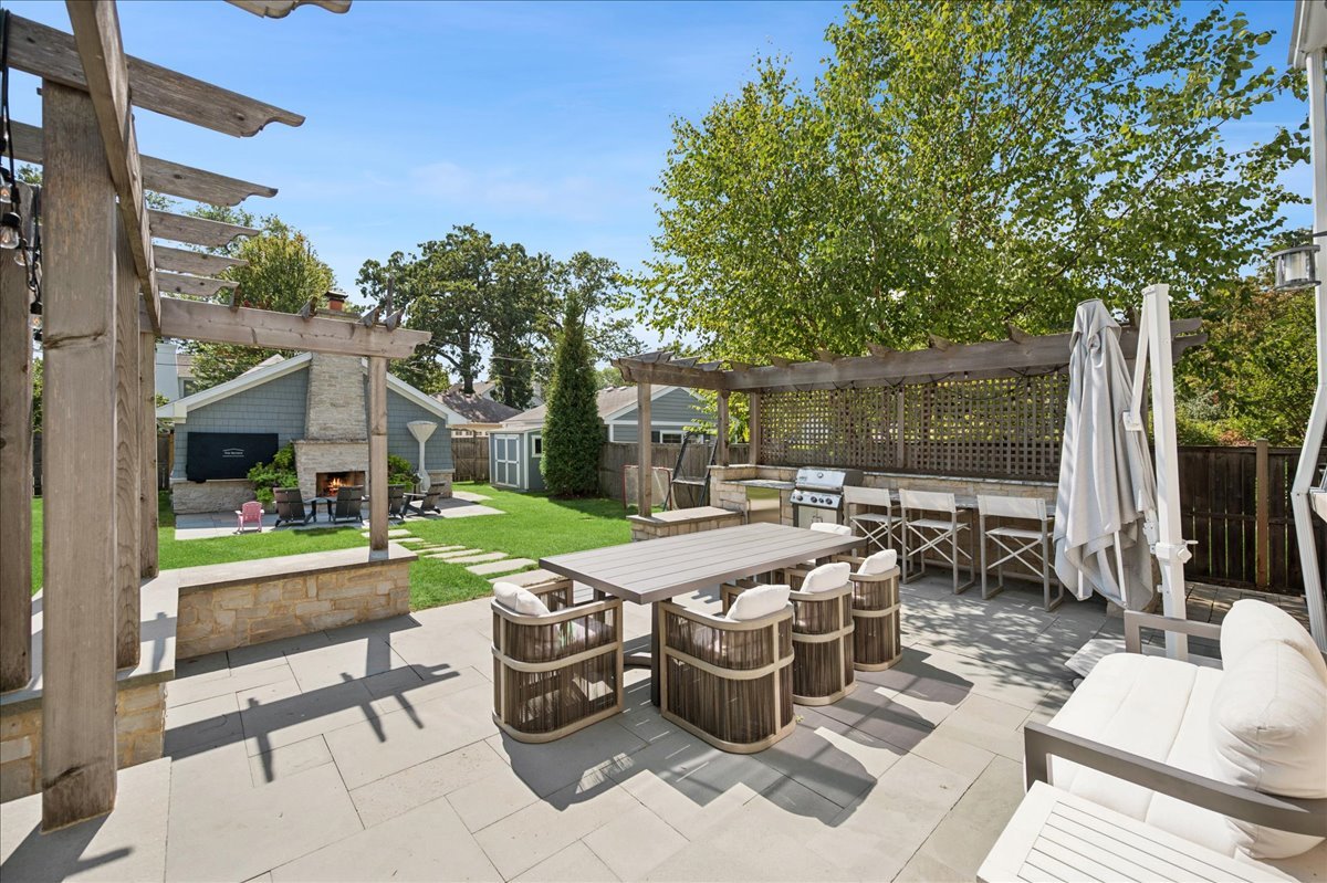 1004 Oak Street Winnetka, IL 60093 - Photo 46 of 51 a view of backyard of house with seating space