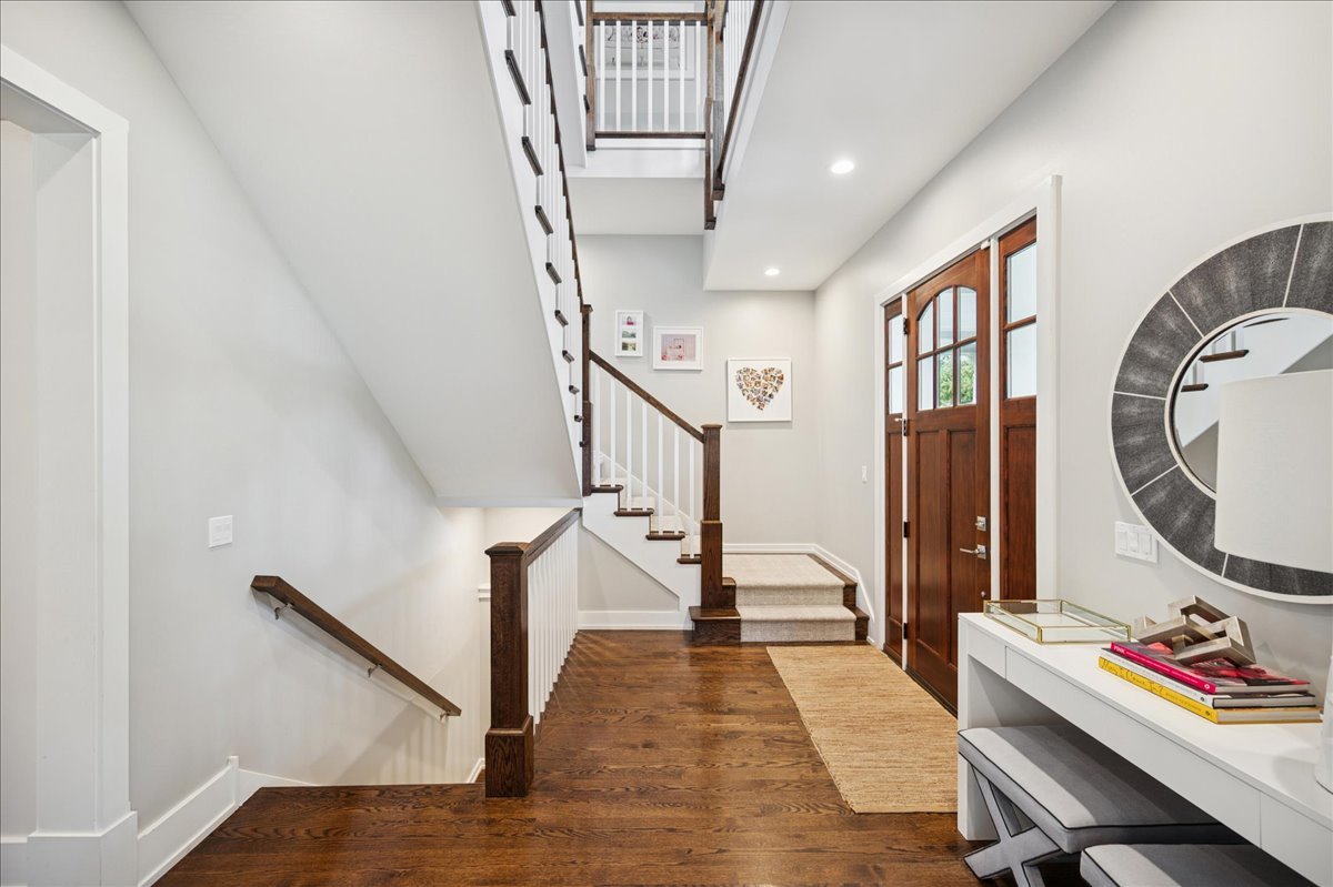 1004 Oak Street Winnetka, IL 60093 - Photo 5 of 51 a view of a livingroom with furniture and stairs