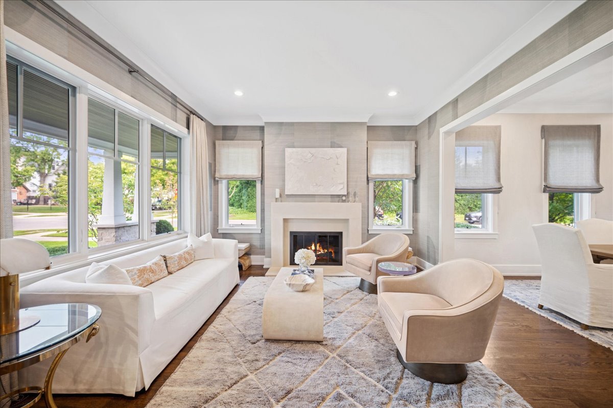 1004 Oak Street Winnetka, IL 60093 - Photo 7 of 51 a living room with furniture fireplace and a large window