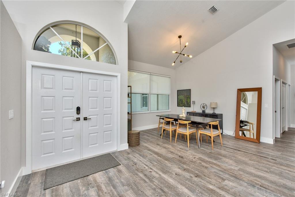 6106 Copper Leaf Lane Naples, FL 34116 - Photo 11 of 35 a view of a livingroom with furniture and furniture