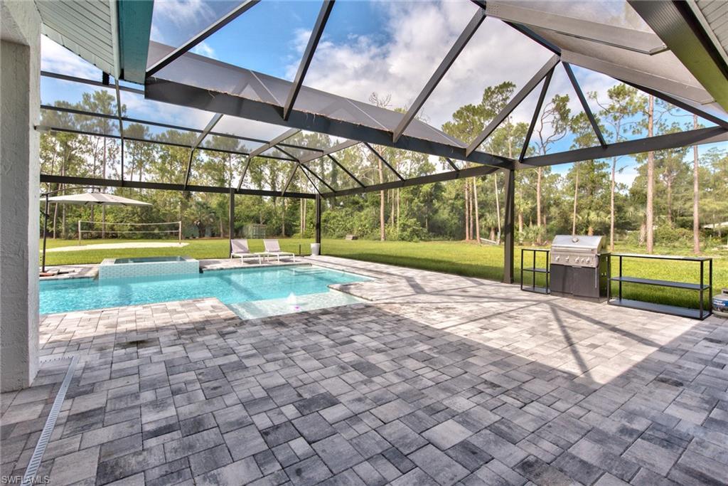 6106 Copper Leaf Lane Naples, FL 34116 - Photo 27 of 35 a view of outdoor space with swimming pool