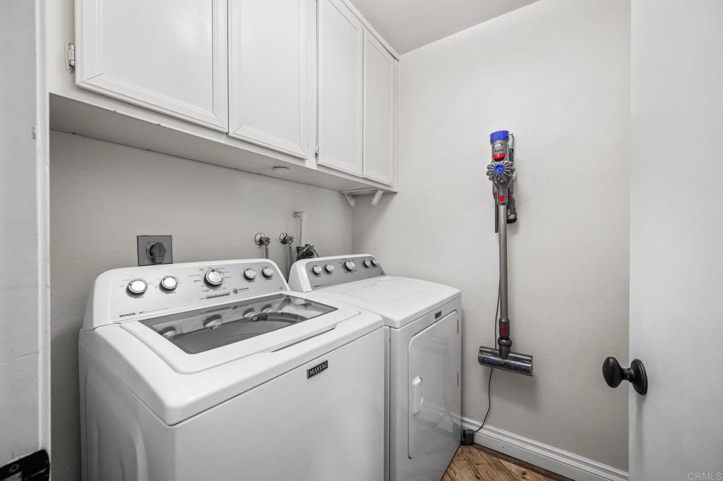 1935 Sunset Drive, Unit 96 Escondido, CA 92025 - Photo 13 of 24 a utility room with dryer and washer