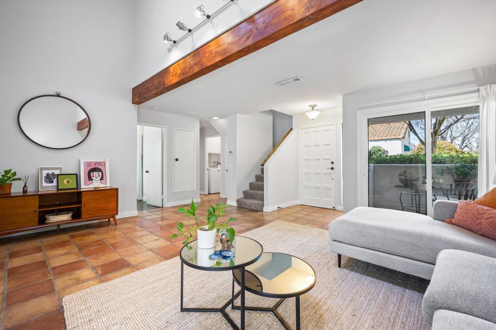 1935 Sunset Drive, Unit 96 Escondido, CA 92025 - Photo 14 of 24 a living room with furniture and a wooden floor
