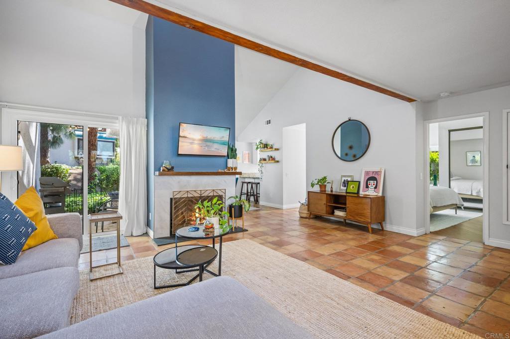 1935 Sunset Drive, Unit 96 Escondido, CA 92025 - Photo 2 of 24 a living room with furniture and a fireplace