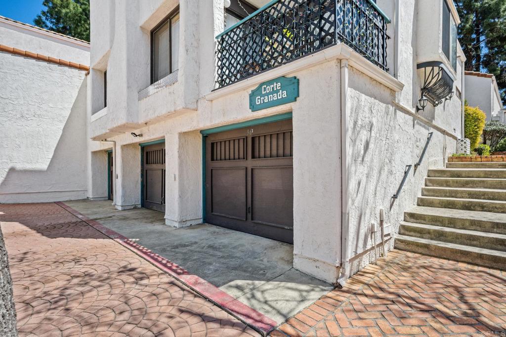 1935 Sunset Drive, Unit 96 Escondido, CA 92025 - Photo 21 of 24 a view of a house with a yard