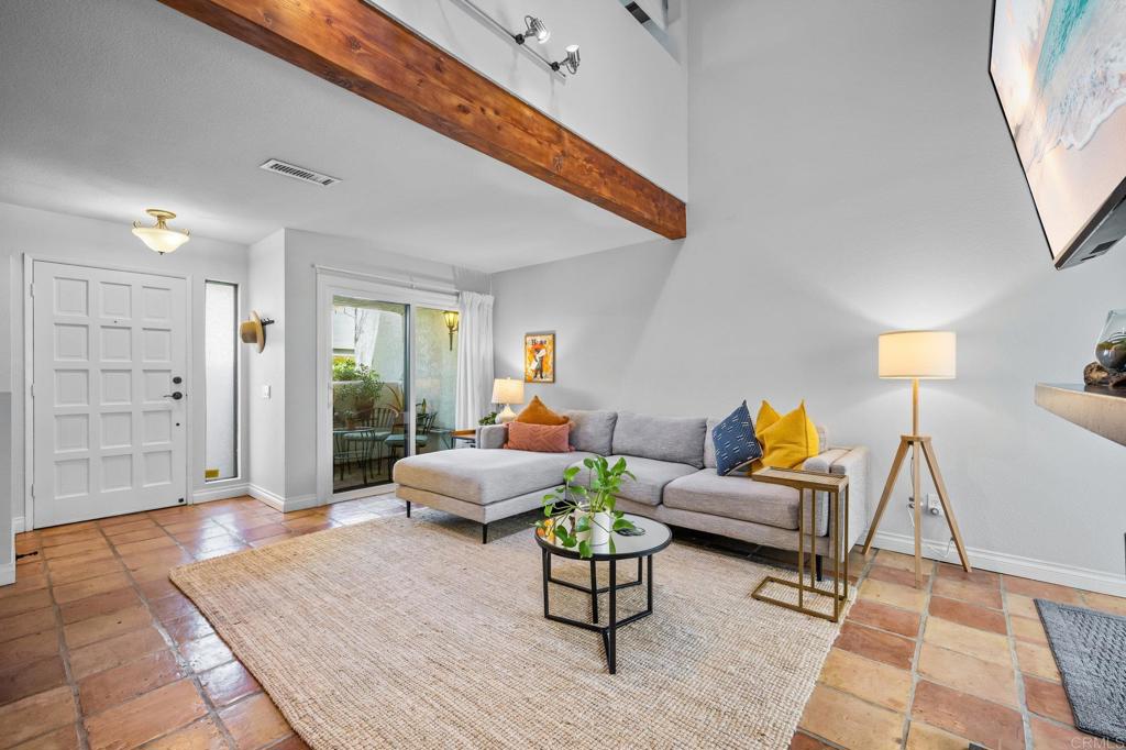 1935 Sunset Drive, Unit 96 Escondido, CA 92025 - Photo 3 of 24 a living room with furniture and wooden floor