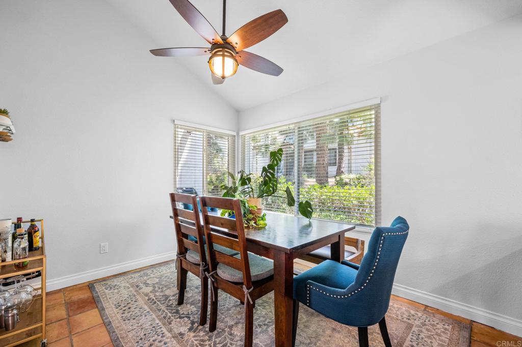 1935 Sunset Drive, Unit 96 Escondido, CA 92025 - Photo 7 of 24 a view of a dining room with furniture window and outside view