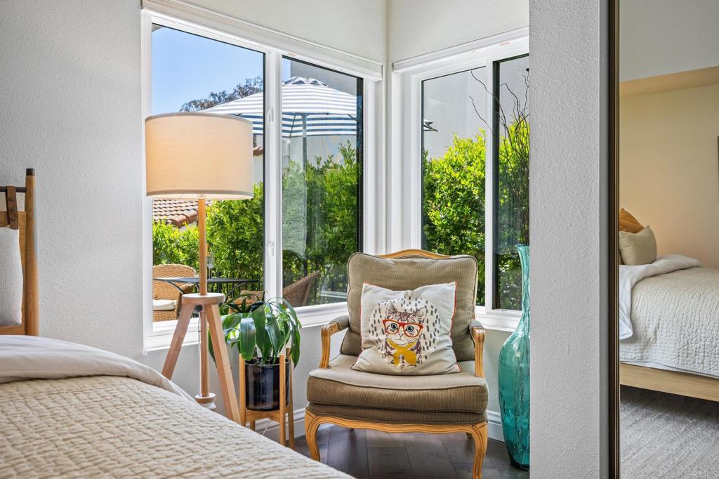 1935 Sunset Drive, Unit 96 Escondido, CA 92025 - Photo 10 of 24 a living room with furniture and a potted plant