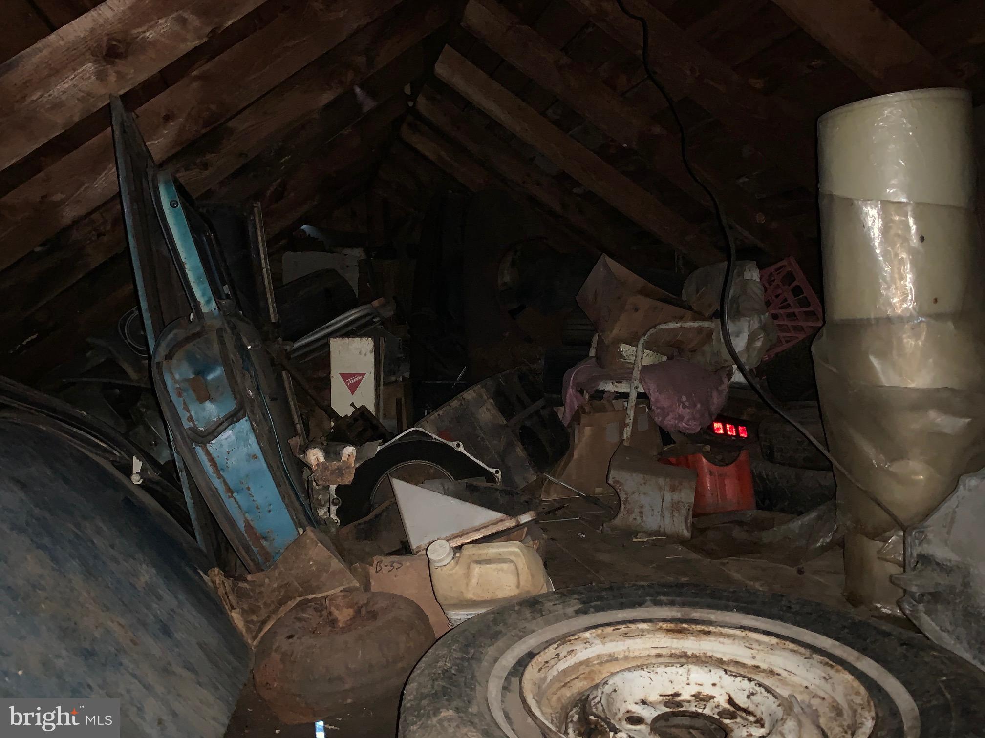 8999 Wellington Road Manassas, VA 20109 - Photo 17 of 20 Garage attic from stairs