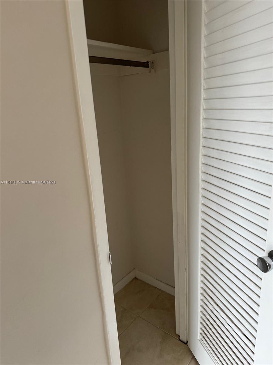 8000 Harding Avenue, Unit 4D Miami Beach, FL 33141 - Photo 16 of 16 a view of stairs